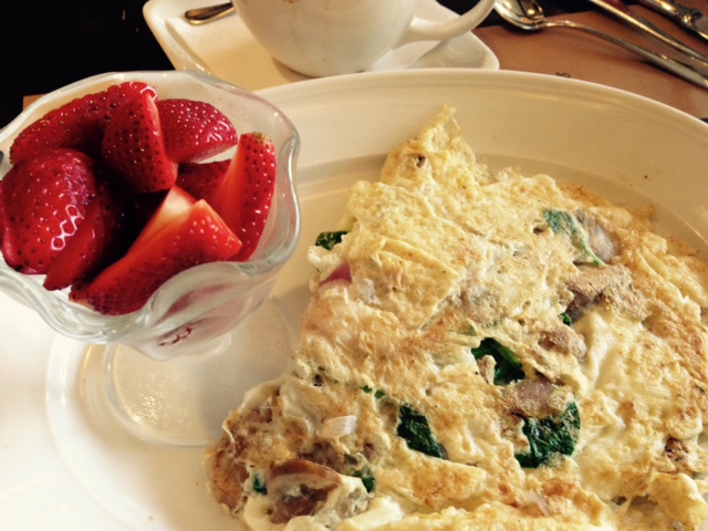 3 egg white omelette with onions, spinach and jalapenos and strawberries on the side